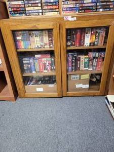 lot 1001 image: WOODEN DISPLAY UNIT WITH GLASS DOORS IN STYLE SHOWN. CONTENTS NOT INCLUDED (DELAYED PICK UP BETWEEN 200 PM AND 400 PM)