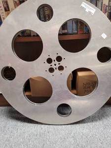 lot 1051 image: LARGE ALUMINUM MOVIE REEL AS SHOWN.