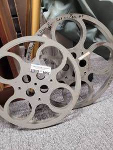 lot 1052 image: LOT OF 2 METAL MOVIE REELS AS SHOWN.