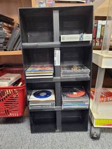 lot 1056 image: CD HOLDER STAND WITH ASSORTED CDS AS SHOWN.