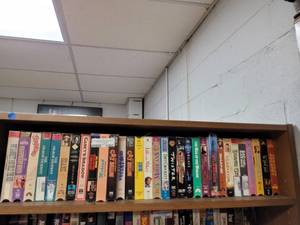 lot 1060 image: LOT OF ASSORTED VHS MOVIES AS SHOWN. (TIER 1 ONLY)