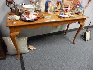 lot 905 image: WOODEN SOFA  ENTRY STYLE TABLE IN STYLECOLOR SHOWN. CONTENTS NOT INCLUDED (DELAYED PICK UP BETWEEN 200 PM AND 400 PM)