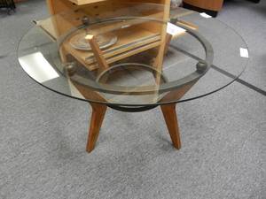 lot 912 image: ROUND WOOD AND METAL BASE COFFEE  ACCENT TABLE WITH GLASS TOP IN STYLECOLOR SHOWN.
