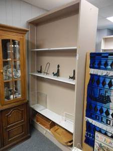 lot 913 image: WOODEN DOUBLE-SIDED UNIT WITH SHELVES IN STYLECOLOR SHOWN. CONTENTS SHOWN NOT INCLUDED (DELAYED PICK UP BETWEEN 200 PM AND 400 PM)