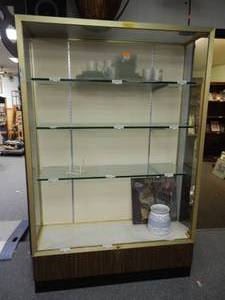 lot 921 image: METAL FRAME DISPLAY UNIT WITH GLASS SIDES AND THICK GLASS SHELVES IN STYLECOLOR SHOWN. CONTENTS SHOWN NOT INCLUDED