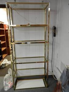 lot 922 image: METAL FRAME DISPLAY UNIT WITH GLASS SHELVES IN STYLECOLOR SHOWN. CONTENTS SHOWN NOT INCLUDED