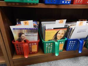 lot 1078 image: ASSORTED RENTAL MOVIE CARDS IN 4 BASKETS AS SHOWN. GENEROUS COUNT