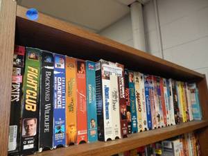 lot 1115 image: LOT OF ASSORTED VHS MOVIES AS SHOWN. (TIER 1 ONLY)