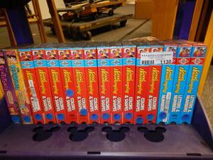 lot 1130 image: GOOD HOUSEKEEPING AND FLINTSTONES VHS MOVIES AS SHOWN.