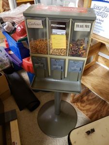 lot 937 image: 3 COMPARTMENT VENDING MACHINE ON STAND. NO KEY.