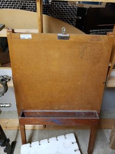 lot 1026 image: VINTAGE 2-SIDED WOOD EISEL AS SHOWN.