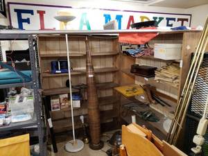 lot 1101 image: WOODEN SHELVING UNIT AS SHOWN. CONTENTS SHOWN NOT INCLUDED (DELAYED PICK UP BETWEEN 200 PM AND 400 PM)