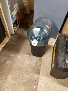 lot 1175 image: PLASTIC 5 GAL WATER JUG AND TRASHCAN