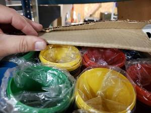 lot 1211 image: PLASTIC CRAYON DRINKING CUPS IN BOXES AND PLASTIC DISPLAYS AS SHOWN.