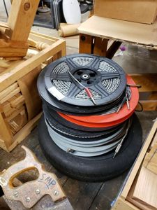 lot 1234 image: LOT OF VINTAGE MOVIE REELS AND BOXES AS SHOWN.