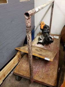 lot 1244 image: FLAT BED STYLE CART WITH HANGING RACK AS SHOWN. CONTENTS NOT INCLUDED