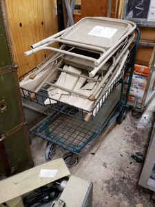 lot 1256 image: SHOPPING CART WITH CONTENTS INCLUDING A FOLDING CHAIR AND MORE AS SHOWN.