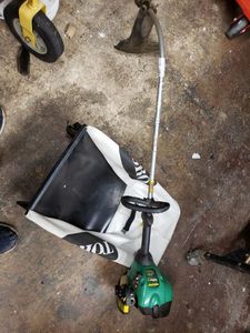 lot 1274 image: FEATHER LITE WEEDEATER AND LAWNMOWER BAG AS SHOWN.