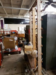 lot 1285 image: SHOP MADE CART UNIT ON METAL WHEEL BASE WITH CONTENTS AS SHOWN.