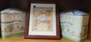 lot 1488 image: DECORATIVE TIN CANISTERS AND FRAME AS SHOWN.