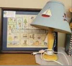 lot 1489 image: FRAMED ARTWORK AND NURSERY LAMP AS SHOWN.