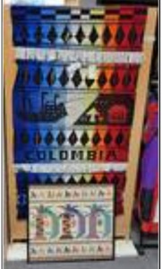 lot 1498 image: LOT OF 2 HANDMADE WALL DECOR PIECES FROM COLOMBIA AS SHOWN.