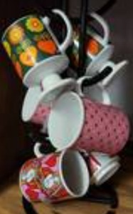 lot 1514 image: LOT OF COFFEE CUPS WITH HOLDER AS SHOWN.