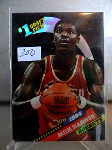 lot 200 image: $$$ DONT MISS $$$ - AKEEM OLAJUWON CARD 1984 #1 DRAFT PICK TOPPS Archives 1993 #4