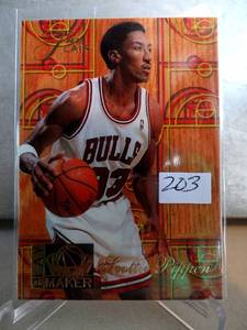 lot 203 image: $$$ 1994-95 Scottie Pippen Flair Playmakers #6 Basketball Card