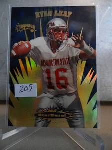 lot 209 image: ROOKIE - 1998 Skybox Thunder Ryan Leaf Starburst #5SB Rookie Washington State NMT-MNT