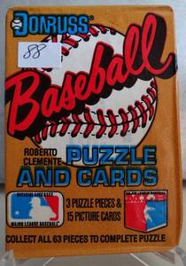 lot 88 image: 1987 SEALED Donruss Baseball Official MLB Clemente Puzzle Cards Leaf Wax Pack MINT - GREG MADDUX OR BARRY BONDS RC