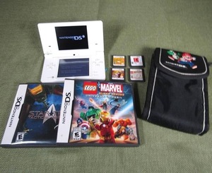 lot 110 image: Nintendo DS game system with games and carry case