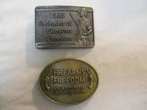 lot 131 image: 2-NRA Belt Buckles