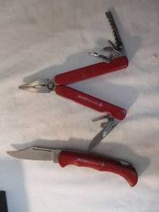 lot 136 image: 2-Swiss Gear- 1-Pocket Knife and 1-Multi Tool