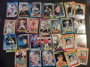 lot 14 image: TOPPS 1990- Various Players and Teams. Cards 652-700. Not consecutive. 31 cards total. Includes 3 1975 �Turn back the clock� 3663 cards. 2 1980 �Turn back the clock 3662 cards. Very good condition, edges slightly worn.