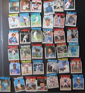 lot 77 image: TOPPS 1986- Various Players and Teams. Cards 300-393. Not consecutive. 37 cards total. Fair condition, slight fade and worn edges.