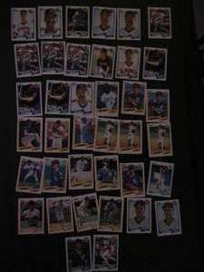 lot 86 image: TOPPS 1990- Various Players and Teams. Cards 35-148. Not consecutive. 40 cards total. Good condition, slight fade and worn edges.