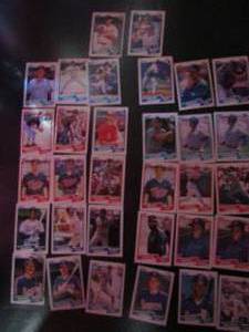 lot 89 image: TOPPS 1990- Various Players and Teams. Cards 300-397. Not consecutive. 32 cards total. Good condition, slight fade and worn edges.
