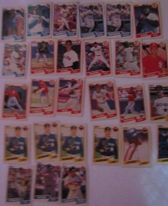 lot 88 image: TOPPS 1990- Various Players and Teams. Cards 207-298. Not consecutive. 27 cards total. Good condition, slight fade and worn edges.