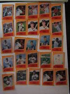 lot 115 image: PRO Cards 1990. Various players and teams. Cards 101-198. Not consecutive. 25 cards total. Good condition, slight fading and staining.