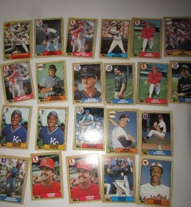 lot 125 image: TOPPS 1987- Various players and teams. Cards 17-88. Not consecutive. 21 cards total. Good condition, slightly worn, some cards have writing. Including TOPPS 1986 �Record Breaker� #6 Ruben Sierra.