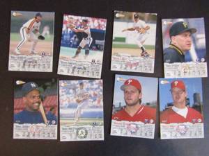 lot 135 image: Pacific 1994 �Crown Collection�- various players and teams. Cards 260-505. Not consecutive. 8 cards total. Okay condition, worn and faded.