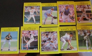 lot 157 image: FLEER 1991- various players and teams. Cards 459-497. Not consecutive. 9 cards total. Good condition, slight worn edges.
