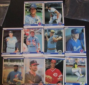 lot 165 image: FLEER 1984- various players and teams. Cards 91-631. Not consecutive. 10 cards total. Fair condition, slight fading, staining, and worn edges.