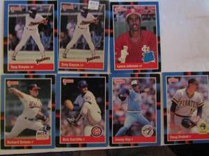 lot 178 image: 1988 DONRUSS- tagged 1987 leaf. Various players and teams. Cards 31-164. Not consecutive. 7 cards total (1 in sleeve). Average condition, edge ware and fading.