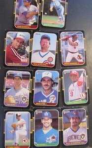 lot 184 image: DONRUSS 1987- tagged 1986 Leaf. Various players and teams. Cards 59-273. Not consecutive, 11 cards total. Fair condition, faded, staining, bent, worn edges.