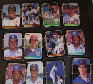 lot 182 image: � DONRUSS 1987- tagged 1986 Leaf. Various players and teams. Cards 401-506. Not consecutive, 12 cards total. Fair condition, faded, staining, bent, worn edges.