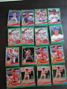 lot 220 image: DONRUSS 1991- various teams and players. Cards 595-608. Not consecutive.12 cards total. Average condition, some bend, slight fade and worn edges.