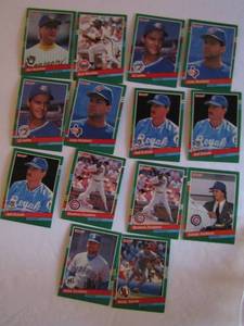 lot 222 image: DONRUSS 1991- various teams and players. Cards 676-703. Not consecutive.14 cards total. Average condition, some bend, slight fade and worn edges.