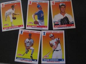 lot 227 image: � SCORE 1991 �First Round Draft Pick�. Cards #380, #674, #675, #389, #384. 5 cards total. Fair condition, some staining, worn edges.